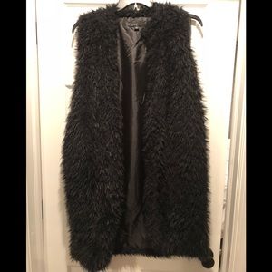 Black faux fur sleeveless coat/vest with pockets